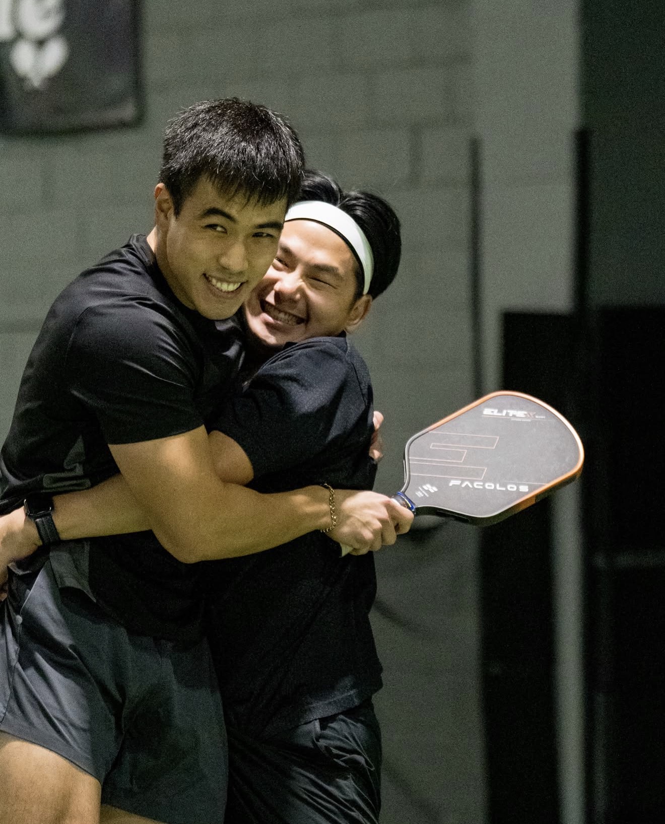 Mates celebrating on court