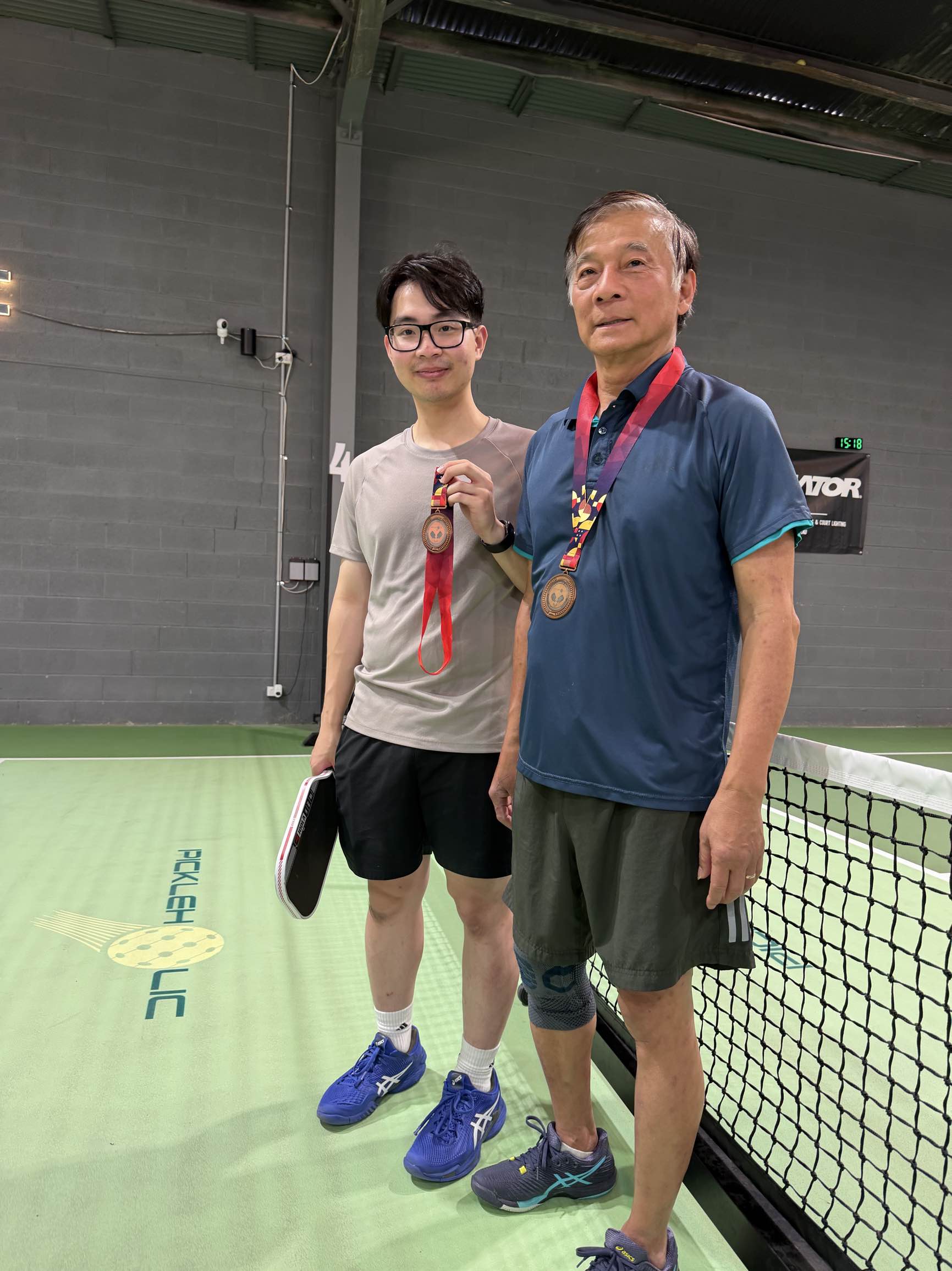 Bronze medal duo at the net